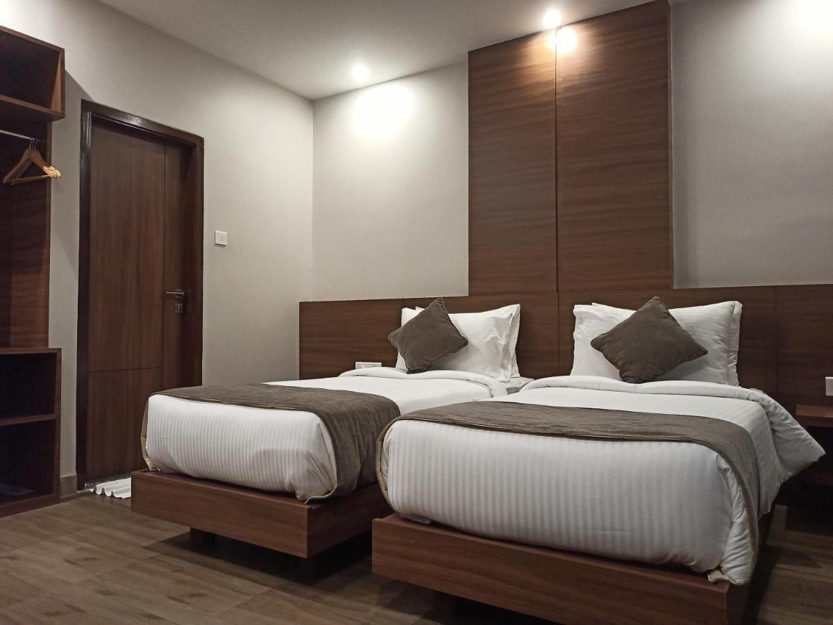 Hotel Tree Fern Дибругарх Экстерьер фото